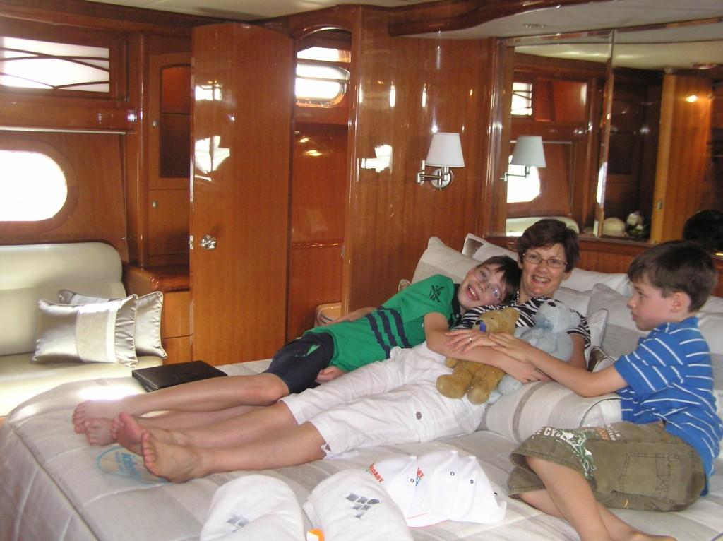 Bradley, Amanda and Aaron relax in the luxury of the main cabin © Stephen Milne